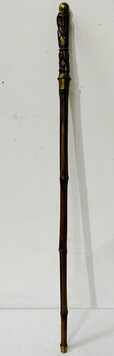 canne à décor africain en os et boule en bronze fut bambou . XX siècle .