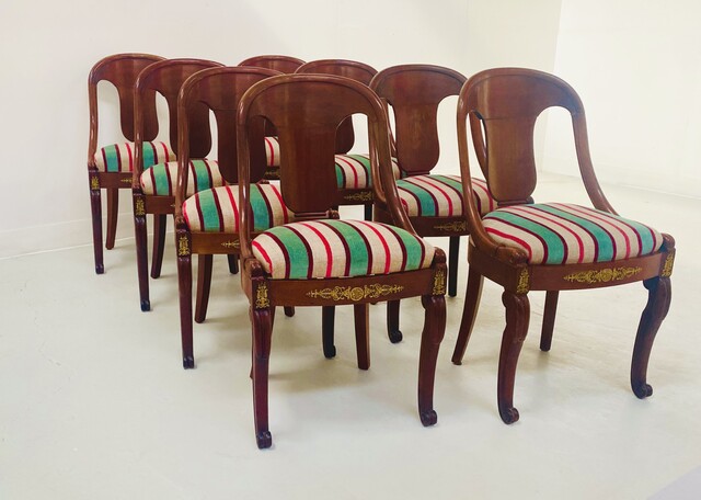 huit chaises style Empire en acajou galette pour assise . XX siècle .