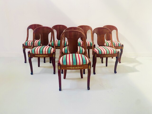 huit chaises style Empire en acajou galette pour assise . XX siècle .