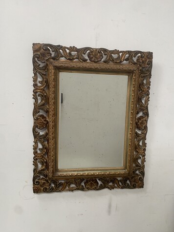 miroir circa 1950 à décor antique cadre bois doré . XX siècle .