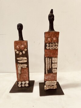 paire de sculptures en céramique émaillée signée daté . XX siècle .