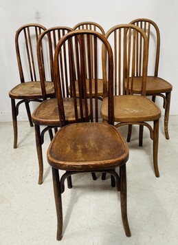 suite de chaises en bois courbet assises bois maison Fischein . XX siècle .
